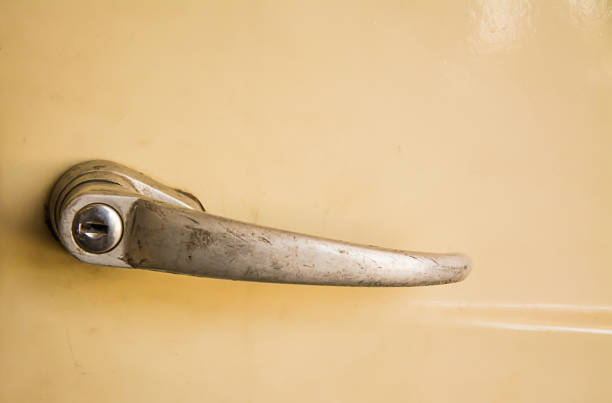 istock Car door handle, vintage car 817198194