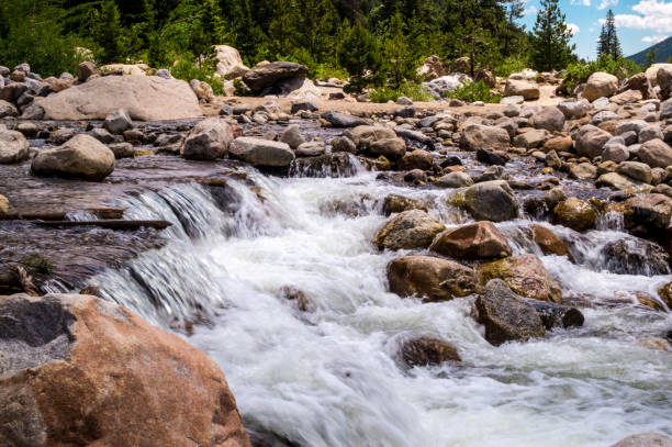 istock Cobblestones and mountain stream. Rapid water flow 817208770