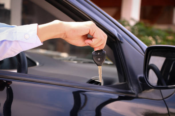 istock Business man showing key 817213582