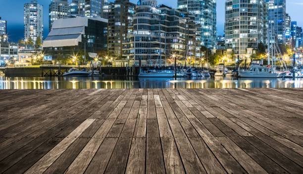 istock illuminated waterfront skyline and harbor at night,vancouver 817213666