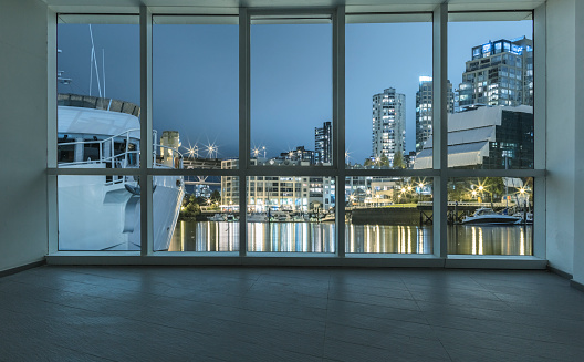 illuminated yaletown harbor outside the windows,Vancouver,Canada.