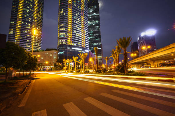 istock Night scene of modern city with light trails. 817213828