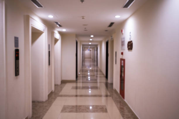 istock Abstract blur corridor in building with bokeh for background usage 817218560