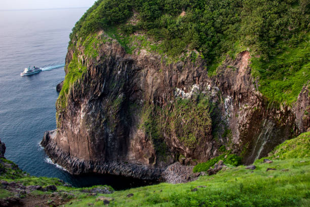 Furepe waterfall Shiretoko National Park, located on the Shiretoko Peninsula in eastern Hokkaido juts out into the Sea of Okhotsk. 

 shiretoko mountains stock pictures, royalty-free photos & images