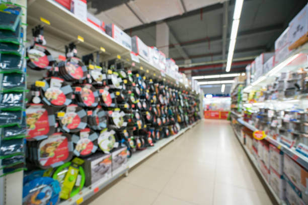 istock Supermarket blurred background with colorful shelves and unrecognizable customers 817223852