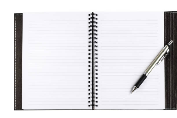 istock Notebook clean blank white paper with lines and black cover and formal pen on white background for text decoration 817233130