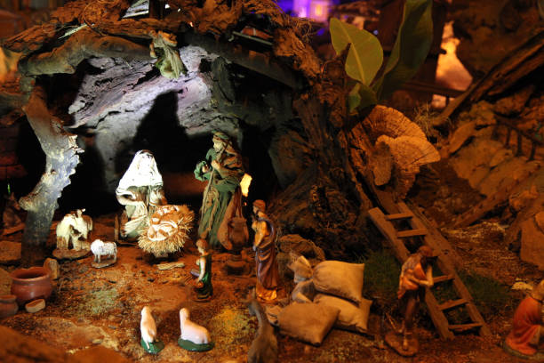 istock Christmas nativity scene with figurines including Jesus, Mary, Joseph, and sheeps 817236372