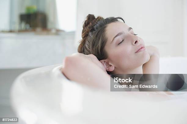 Woman Relaxing In Bubble Bath Stock Photo - Download Image Now - Bathtub, One Woman Only, Relaxation