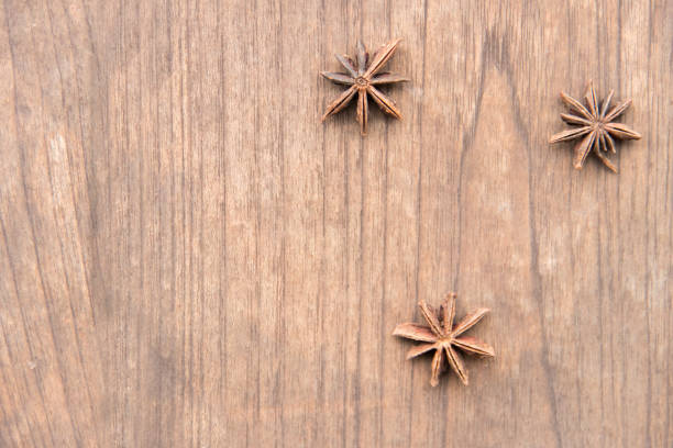 istock Star anise on wooden top view angle view. copy space 817253864