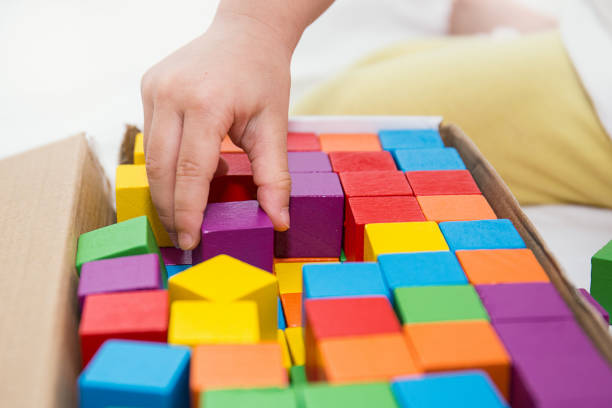 istock Stack of colorful wooden blocks on a white background. 817264060