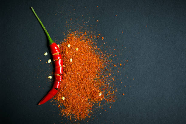 istock Red chili pepper and chili flakes 817282272