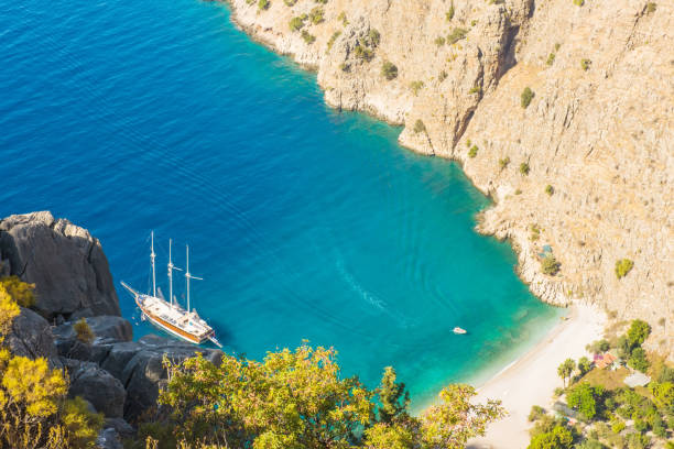 istock Butterfly valley sea view and boat Oludeniz,Turkey 817290428