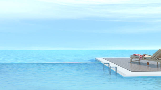 istock Sunbathing deck and Wood sofa with swimming pool and sea 3d rendering Vacation time 817290598
