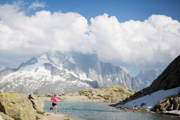 istock Fit female running in the mountains 817298946