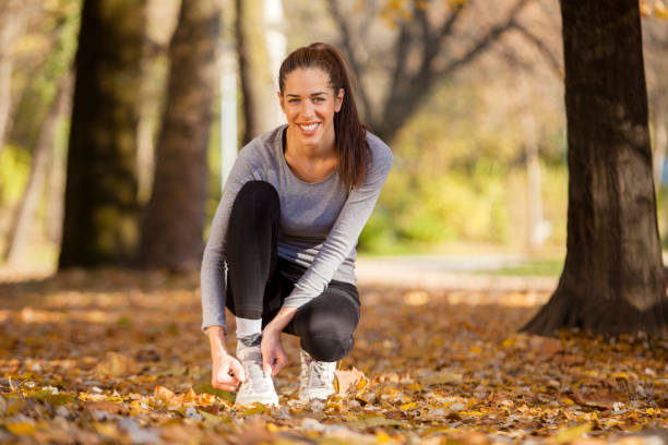 istock Young Woman exercise in the park 817301628