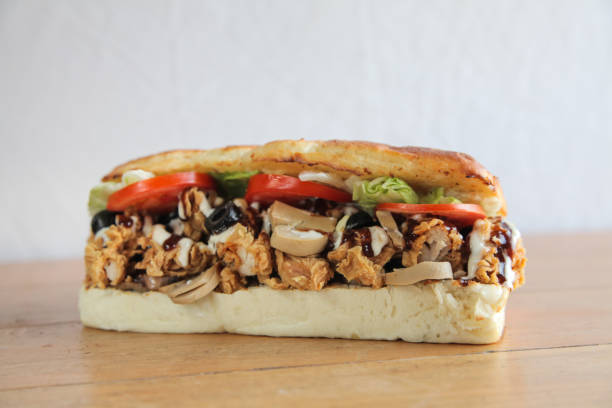 istock Fried Chicken foot long sub sandwich 817307690