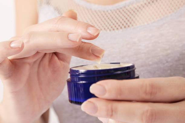 istock Woman applying cream 817313864