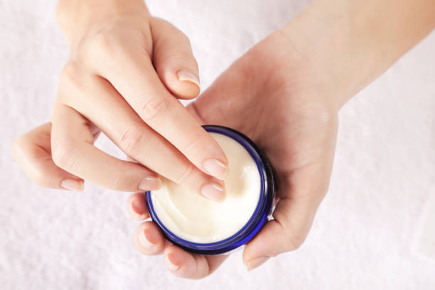 istock Woman applying cream 817313916