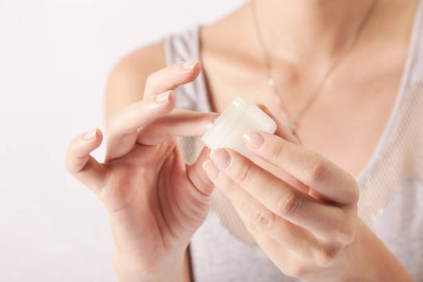 istock Woman applying cream 817314114