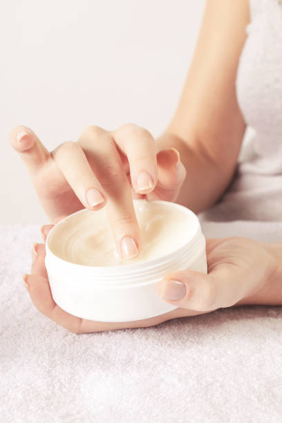 istock Woman applying cream 817315242