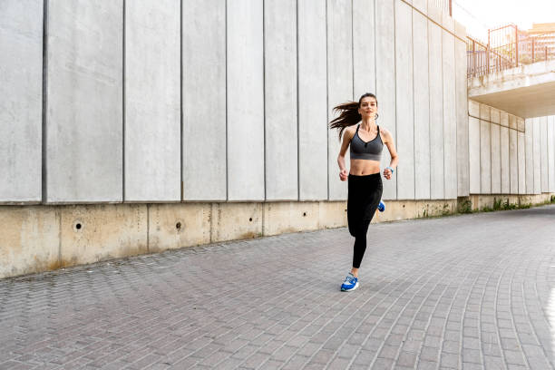 istock Happy girl enjoying her sport activity 817322200