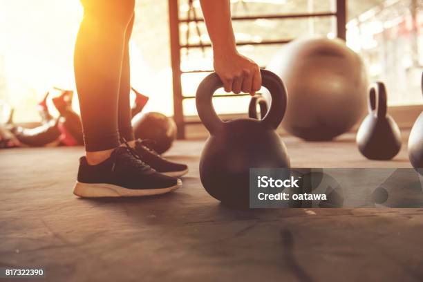 Fitness Training With Kettlebell In Sport Gym Stock Photo - Download Image Now - Exercising, Morning, Cross Training