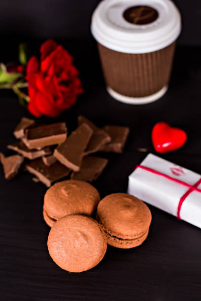 istock Classic French macaroons on a black background 817325178