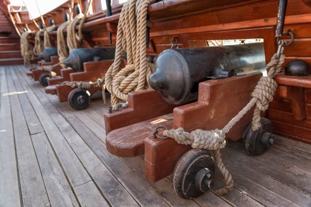 Cannons At The Deck Of A Galleon Cannons At The Deck Of A Galleon armada stock pictures, royalty-free photos & images