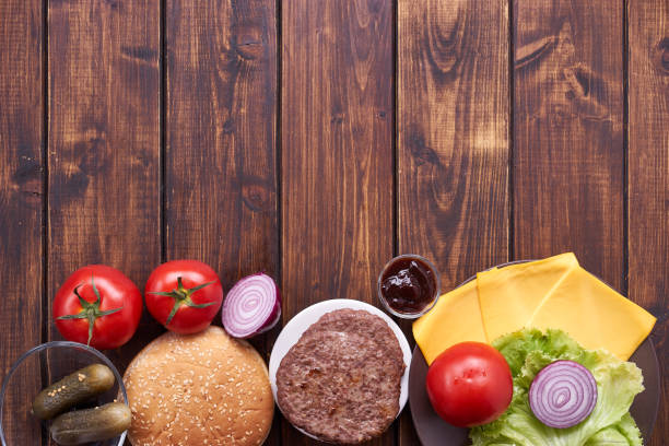 istock Top view of cheeseburger ingredients 817331062