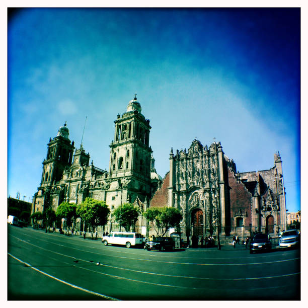 Tourists on the main square, the Zocalo, in front of the Metropolitan Cathedral (Catedral Metropolitana) in Mexico City. Shot with an iPhone.