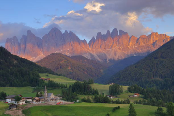 istock Santa Magdalena village in front of Dolomites Group, 817338536