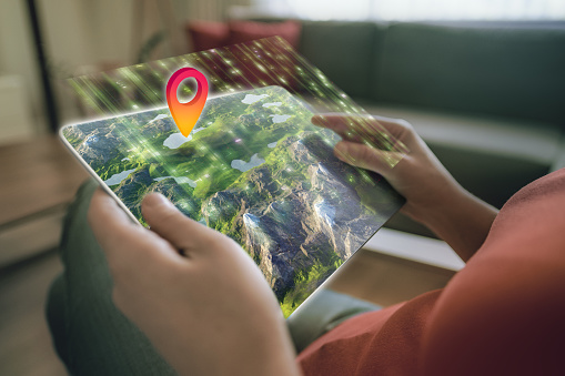 Augmented reality on a tablet. 3D map element designed by photographer.