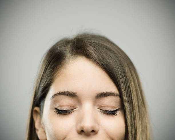 Happy, relaxed young woman's face in close-up.