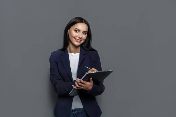 istock Business woman checking schedule at work 817368260