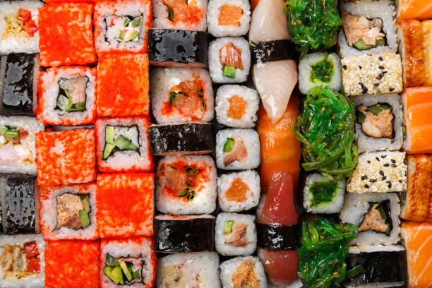 istock Set of sushi, maki and rolls background 817383920