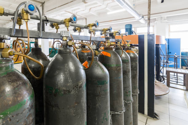 istock Rows of gray gas cylinders 817388902