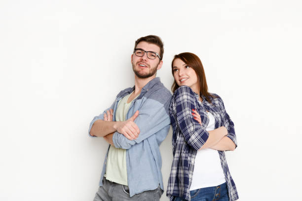 istock Studio shot of casual couple standing back to back 817404986
