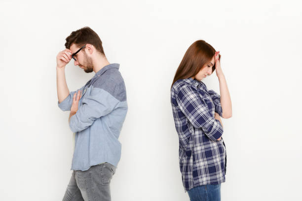 istock Break up, upset couple back to back after quarrel 817405076