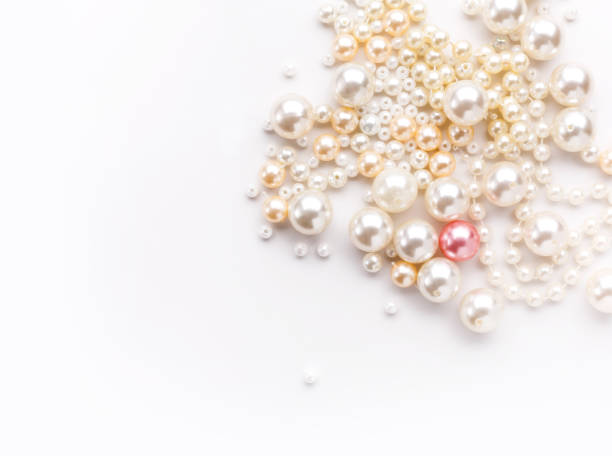 istock Pile of colorful pearl on white background 817408908