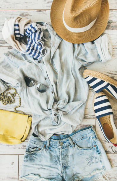 istock Summer woman's outfit flatlay, top view, vertical composition 817409274