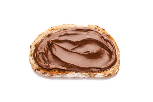 초콜릿과 헤이즐넛 흰색 배경에 고립 된 빵 조각에 확산 - bread isolated white portion 뉴스 사진 이미지