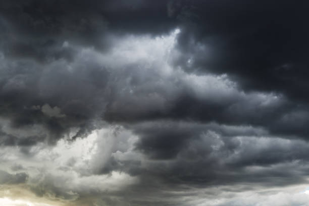 istock Dark cloud, rain cloud, stormy before rain. gray storm cloud at sunset. 817409914