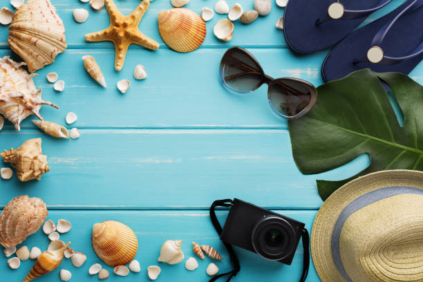istock Vacation background on blue wood, top view with copy space 817420784
