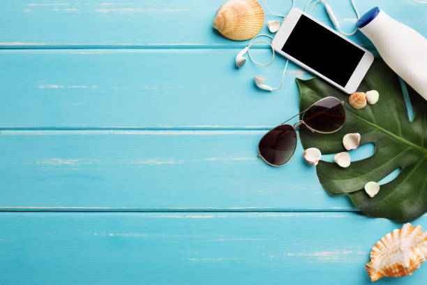 istock Vacation background on blue wood, top view with copy space 817421044