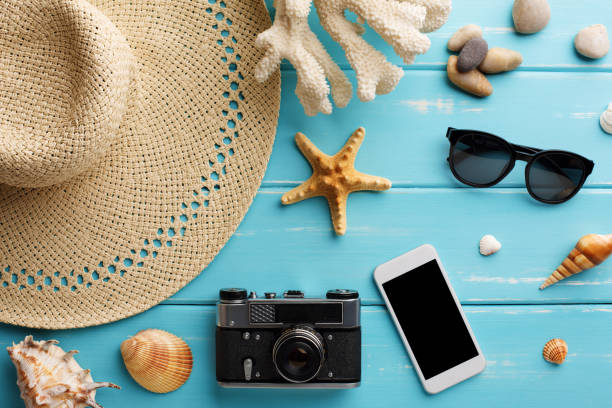 istock Vacation background on blue wood, top view with copy space 817421262