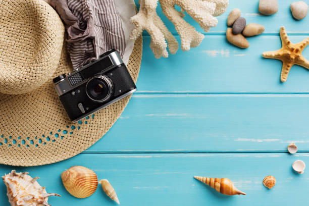 istock Vacation background on blue wood, top view with copy space 817423344