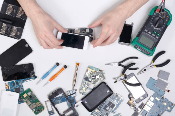 istock Repairing smartphone, dissasembling phone top view 817428908