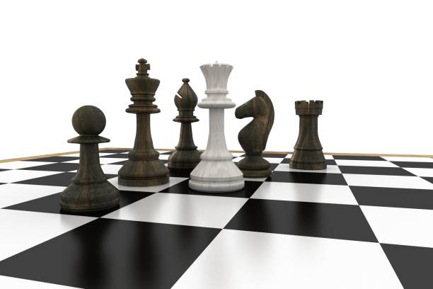 istock White queen surrounded by black pieces 817431424