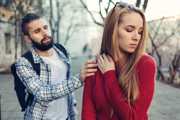istock Boy reaching out and touching his girlfriend on the shoulder 817432066