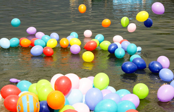 Balloons on the water Balloons on the water inflamable stock pictures, royalty-free photos & images